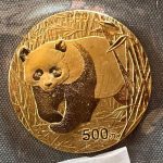 Zlatnik 1 unca Kineski panda iz 2002. godine, 500 juana